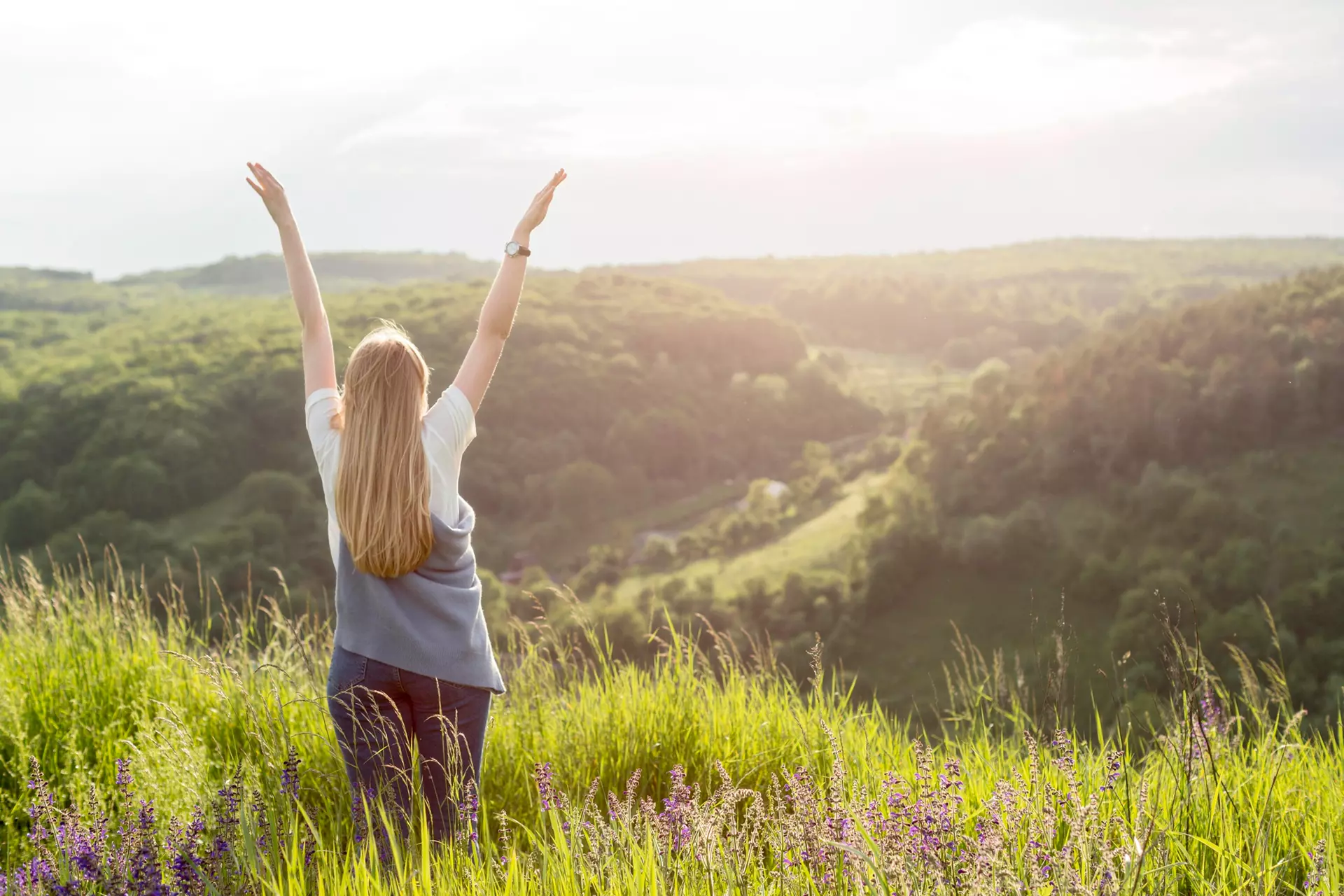 Woman enjoying nature after dental implants